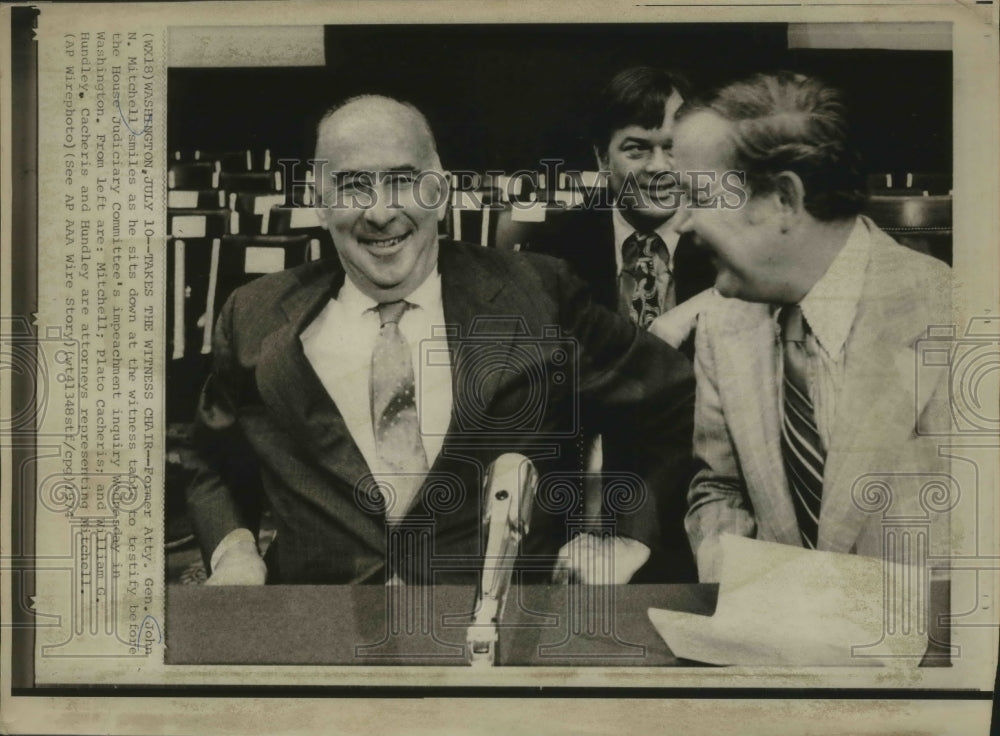 1974 Press Photo Former Attorney General John N. Mitchell with his attorneys.