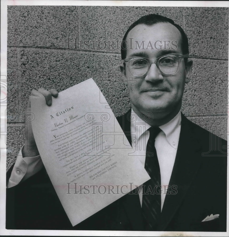 1962 Press Photo Newton Minow shows award from Milwaukee County Radio&TV Council