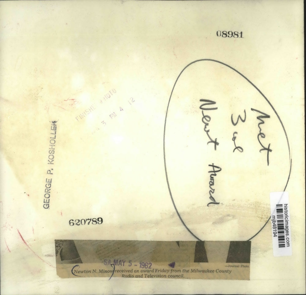 1962 Press Photo Newton Minow shows award from Milwaukee County Radio&TV Council