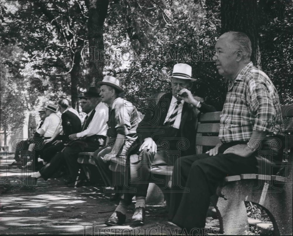 1964 Press Photo Men Sit And Chat On The Benches In Red Arrow Park - mjb48893- Historic Images