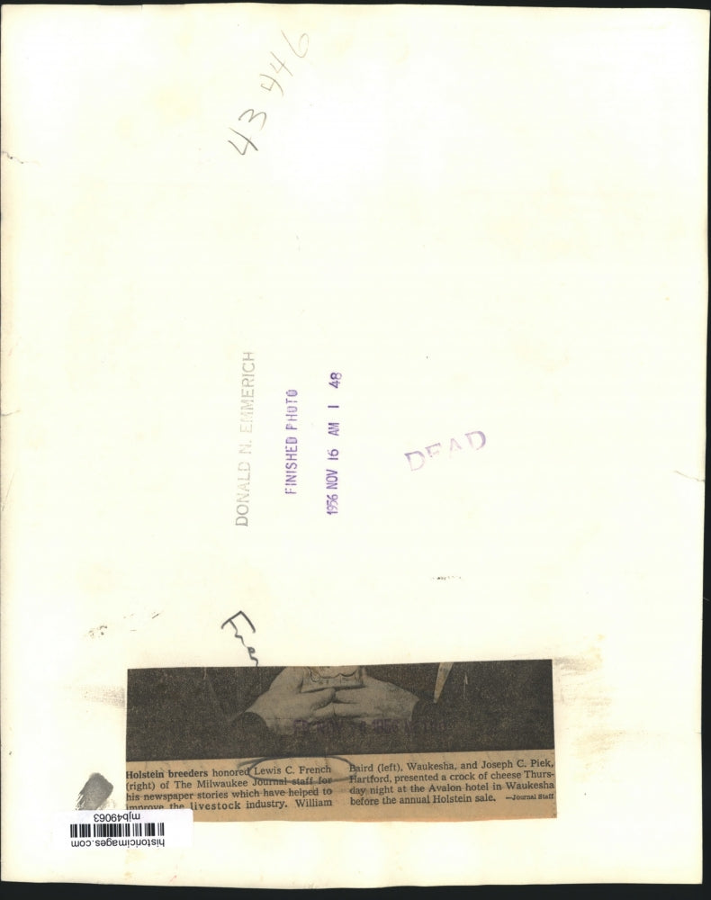 1956 Press Photo Lewis French awarded crock of cheese from Holstein breeders, WI