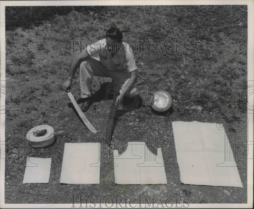 1954 Press Photo The Jungle Worker displays Bags used in transporting chicle sap- Historic Images