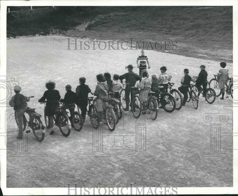 Load image into Gallery viewer, 1957 Press Photo Fisher School students on bikes, Milwaukee - mjb50563
