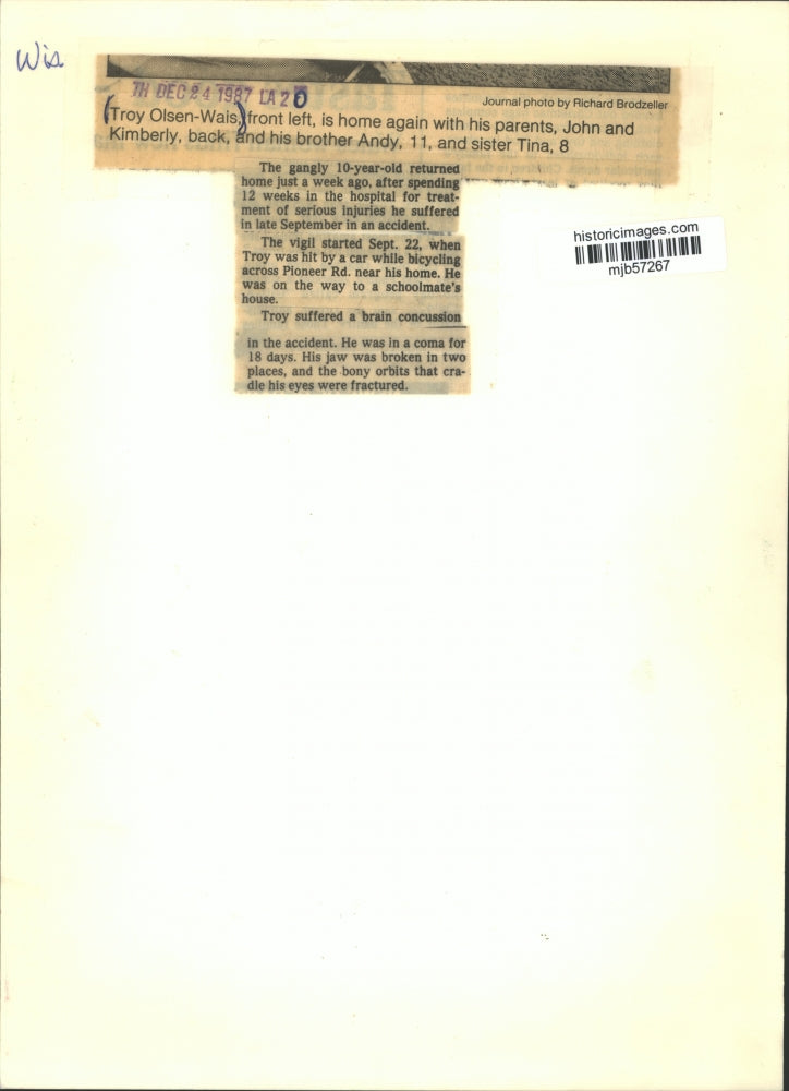 1987 Press Photo Troy Olsen-Wais is home again with family after hospital stay