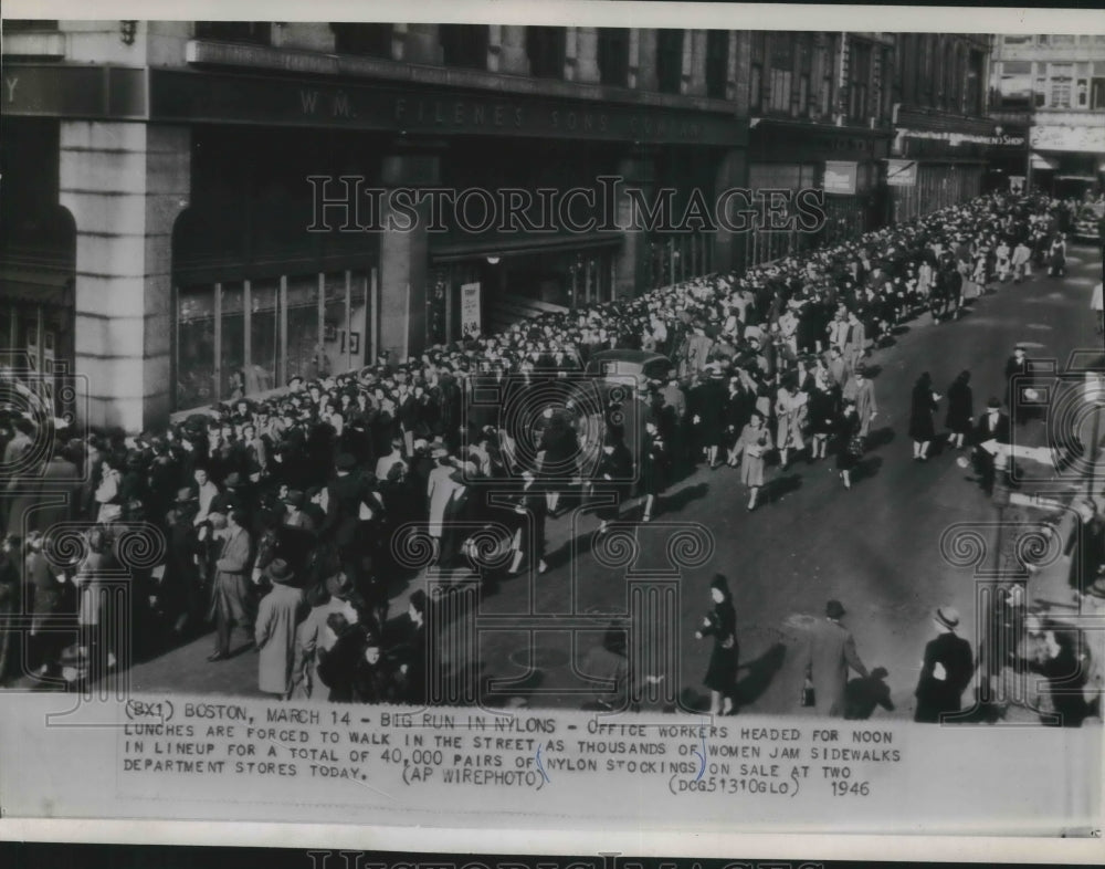 1946 Press Photo Boston office workers walk around crowd lined up for stockings