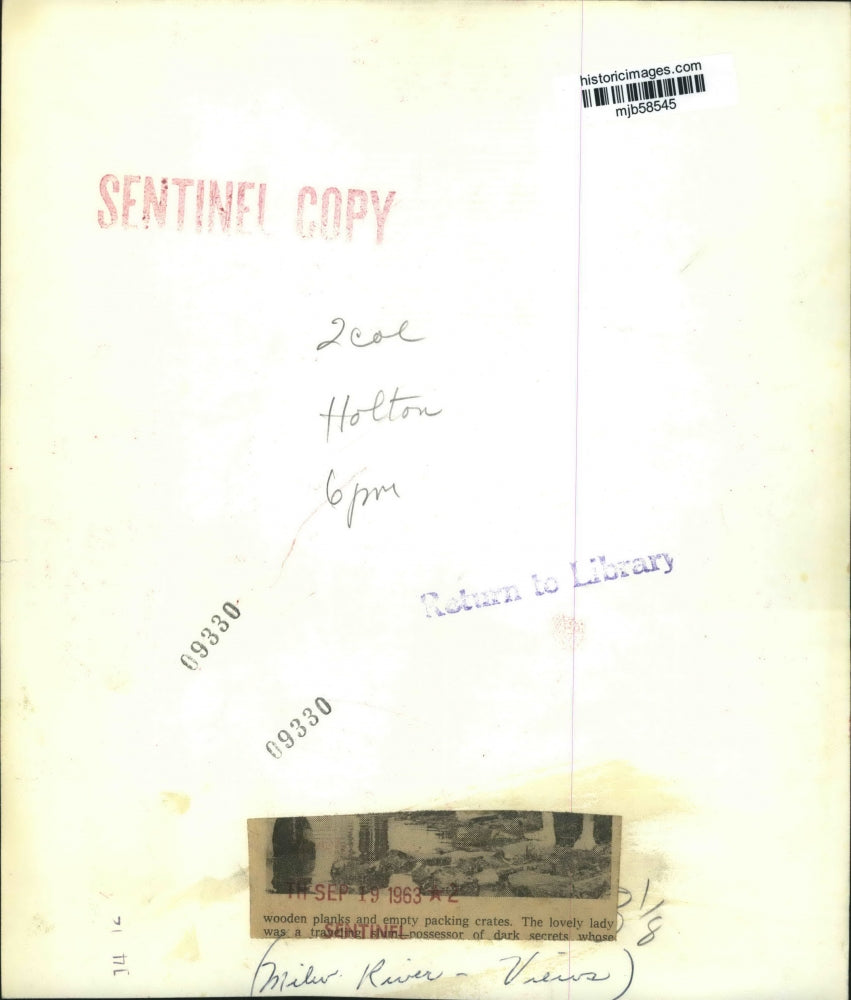 1963 Press Photo Woman Standing by the Milwaukee River in Wisconsin - mjb58545