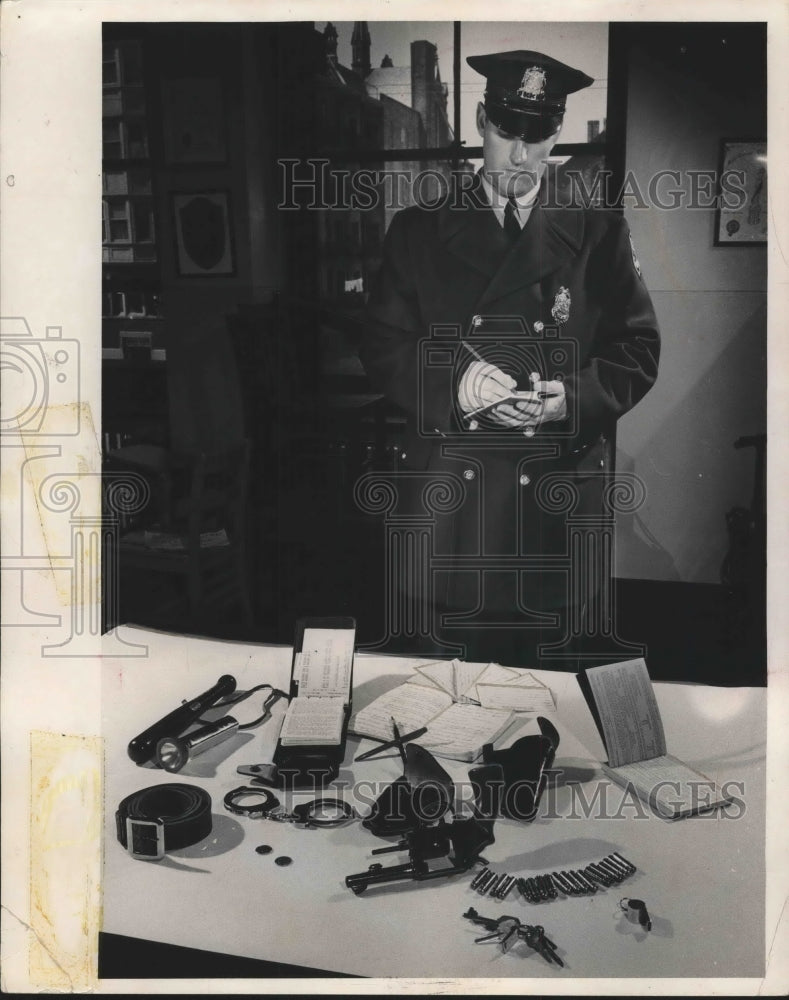 1961 Press Photo Andrew Ambos Police Patrolman with the Tools of His Trade- Historic Images