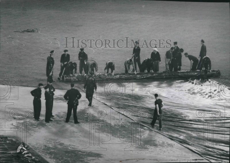 Load image into Gallery viewer, 1953 Press Photo Umpires inspect infield after rain delay, Milwaukee Stadium
