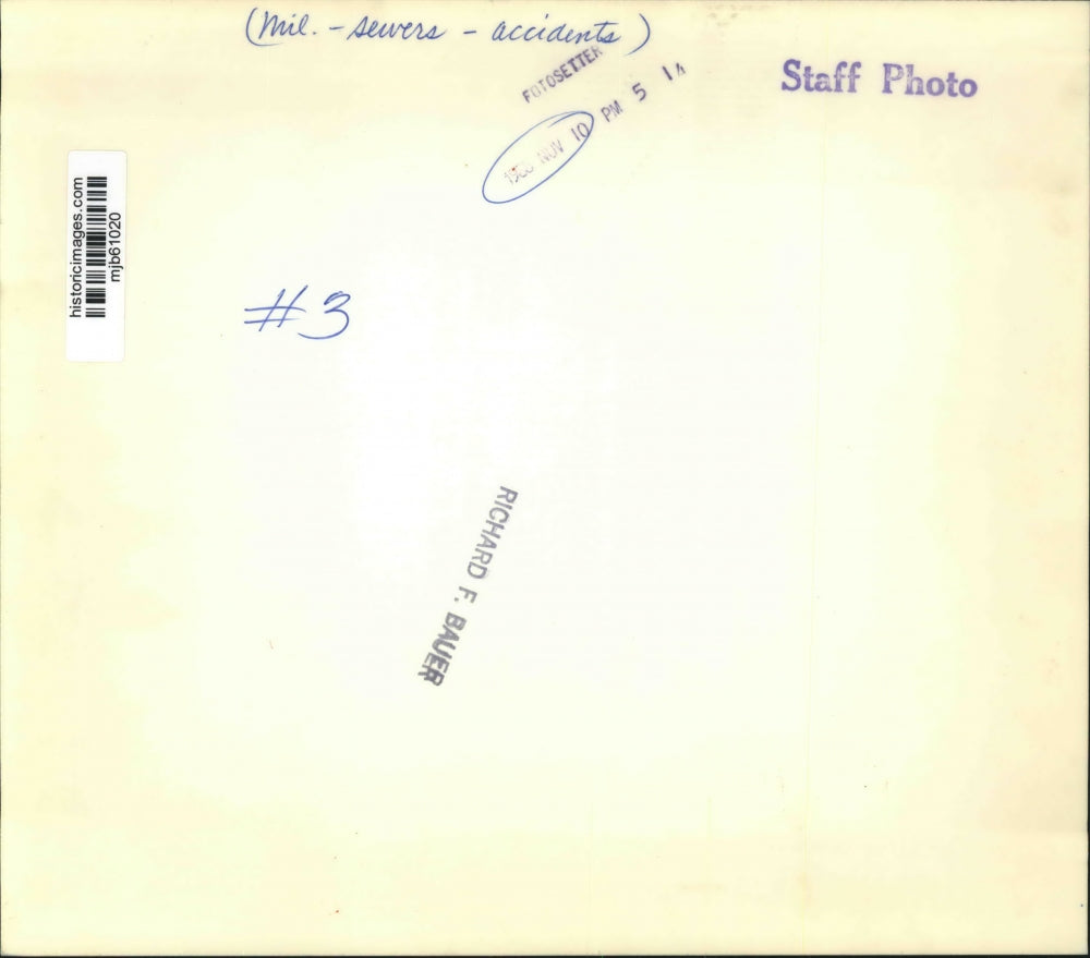 Press Photo Men Discuss Milwaukee Sewer Accident - mjb61020