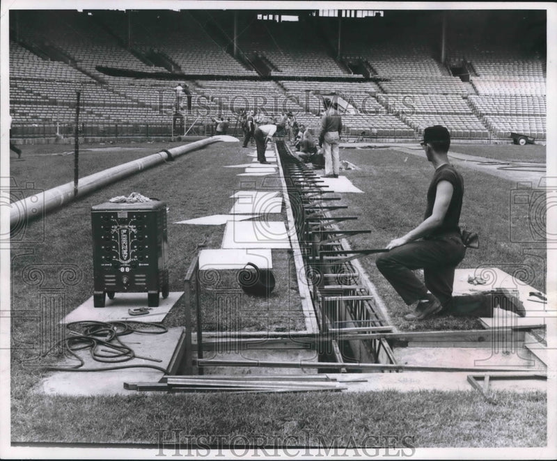 Load image into Gallery viewer, 1959 Press Photo New mechanical tarp with be rolled out at Milwaukee Stadium
