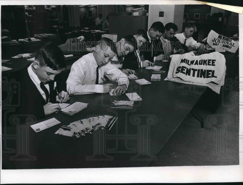 Load image into Gallery viewer, 1964 Press Photo Milwaukee Sentinel paperboys writing thank you letters

