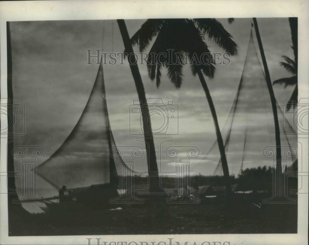 1930 Press Photo Fishing nets and native life and tropical sunset, Philippines- Historic Images