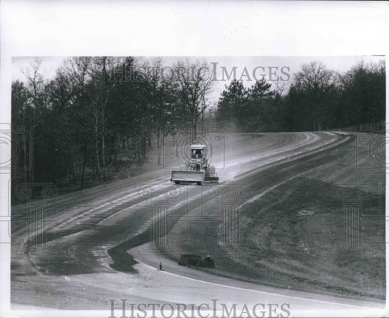 Load image into Gallery viewer, 1968 Press Photo Grader levels gravel near Jackson County Line, Wisconsin
