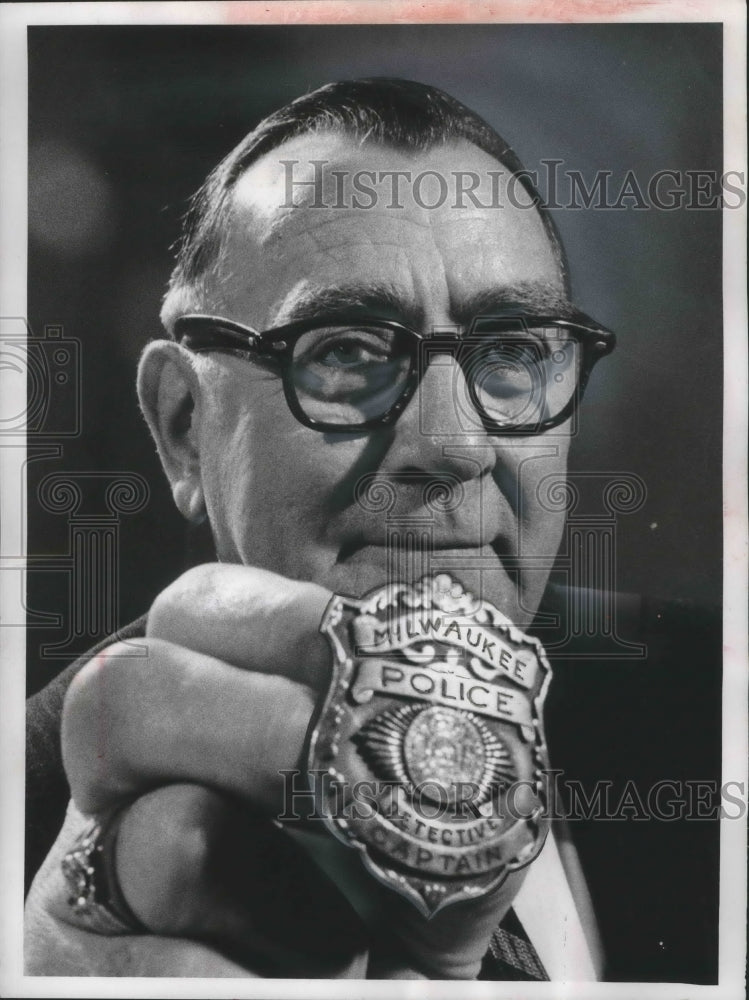 Load image into Gallery viewer, 1960 Press Photo Captain Charles Nowakowski, turns in badge after 41 years.

