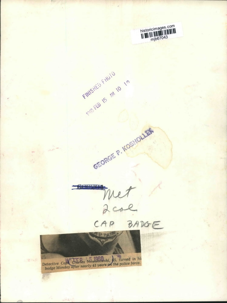 1960 Press Photo Captain Charles Nowakowski, turns in badge after 41 years.