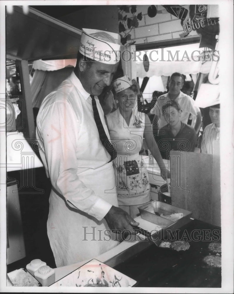Load image into Gallery viewer, 1961 Press Photo Governor Nelson cooks hamburgers at state fair - mjb69065
