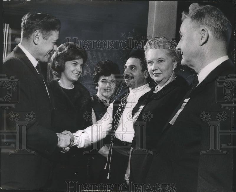 Load image into Gallery viewer, 1963 Press Photo Mayor and Mrs. Maier receiving others at cocktail party.
