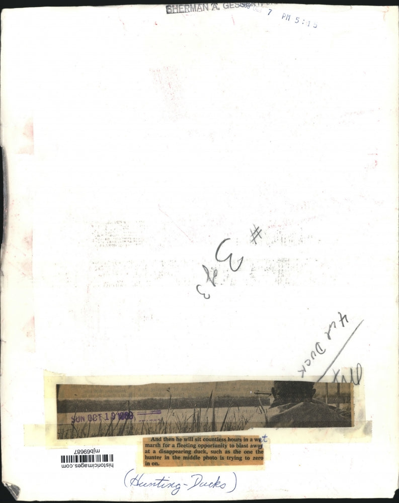 1969 Press Photo Duck hunter aiming his gun while in the marsh - mjb69687