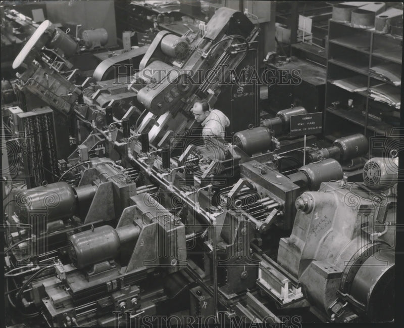 Load image into Gallery viewer, 1954 Press Photo Joseph Zacher displays casting that turns out caps, Wisconsin.
