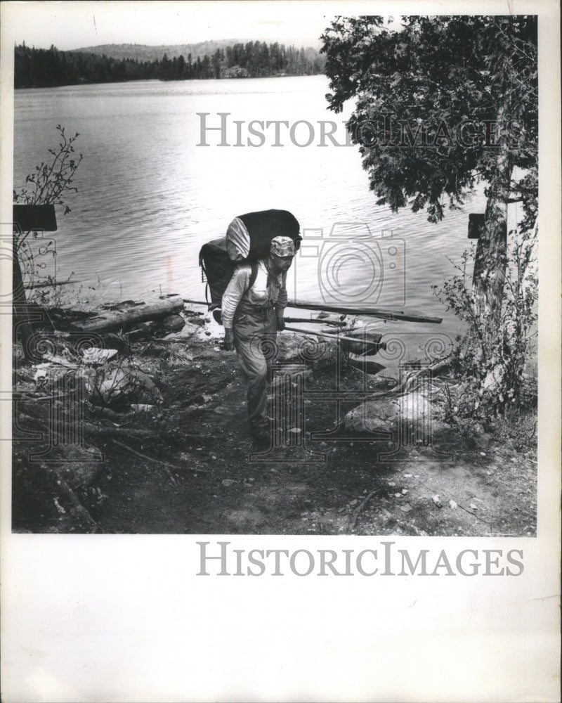 Load image into Gallery viewer, 1963 Press Photo Don Johnson prepares for the Quetico-Superior canoe trails

