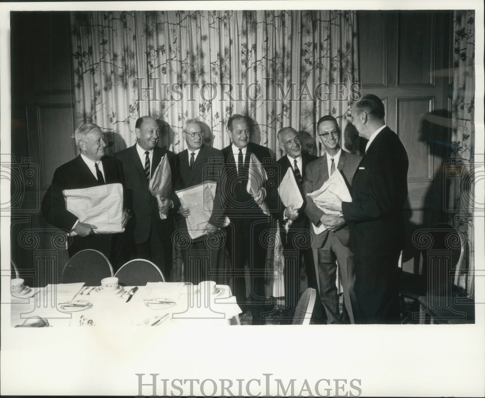 1965 Press Photo Charles Nelson presenting executives plaques, Wisconsin.- Historic Images
