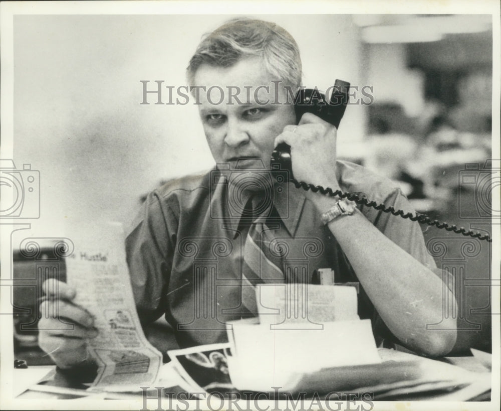 1972 Press Photo Chuck Johnson, Journal Employee in office on phone, Milwaukee.- Historic Images