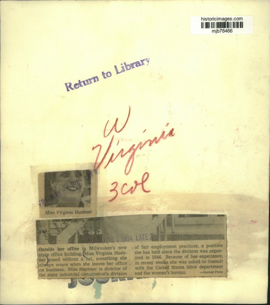 1964 Press Photo Miss Virginia Huebner posed outside her office Milwaukee