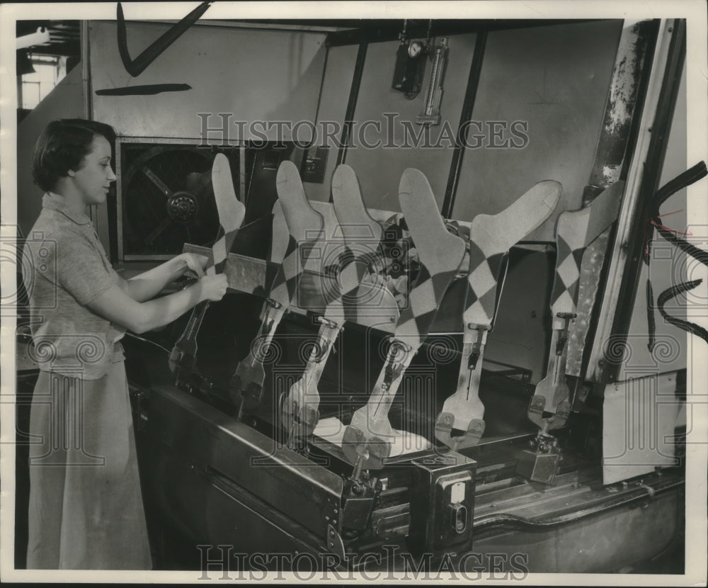 1953 Press Photo Carol Henrichs shaping socks at Milwaukee Phoenix Hosiery Co.- Historic Images