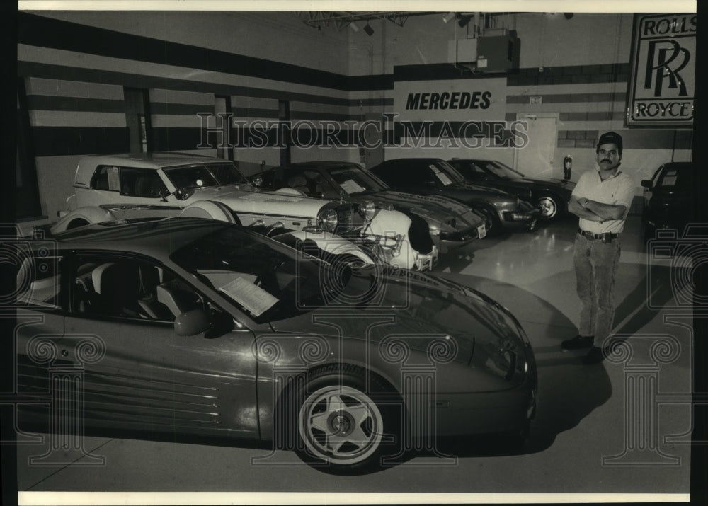 1987 Press Photo Harry Kaufmann stands by specialty and exotic automobiles