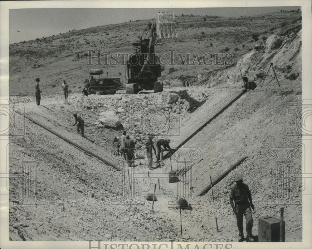 1957 Press Photo Tel Aviv, Israel, construction on Jordon River project- Historic Images