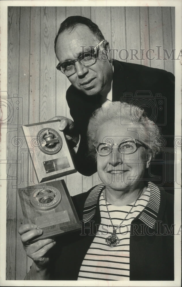 Load image into Gallery viewer, 1966 Press Photo J. E. Dollar and Mrs. Elmer Ott show off their Acorn Awards.
