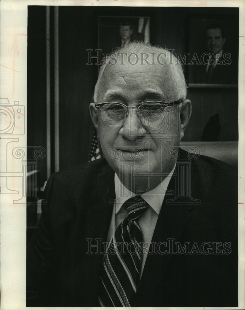 1971 Press Photo Picture of John E. Kalupa in his office. - Historic Images