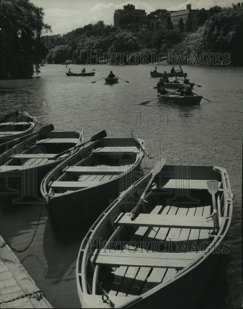 1953 Press Photo Rowboats tied to the dock and in use at Juneau Park, Milwaukee.
