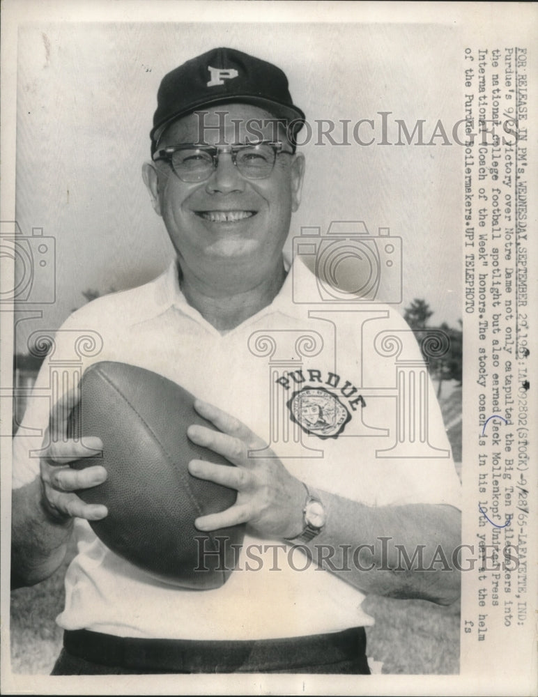 1965 Press Photo Jack Mollenkopf coach of the week shown with football, Indiana.