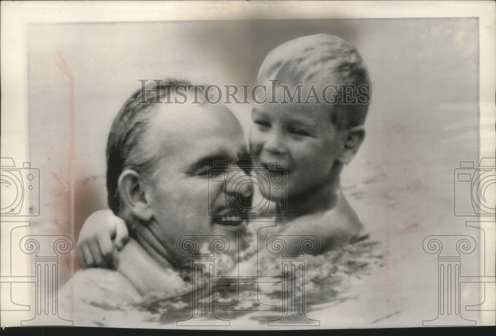 1963 Press Photo Prince Albert holding onto Prince Rainier in water, Monaco - Historic Images