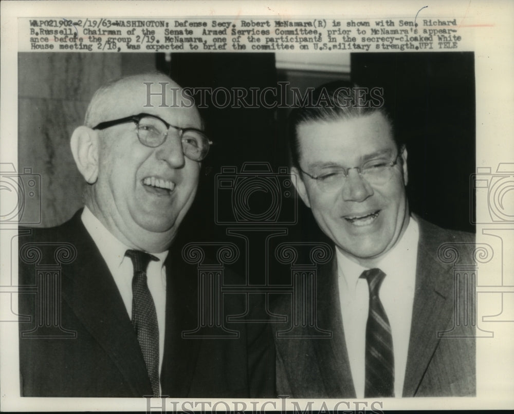 1963 Press Photo Robert McNamara with Richard Russell before military brief.