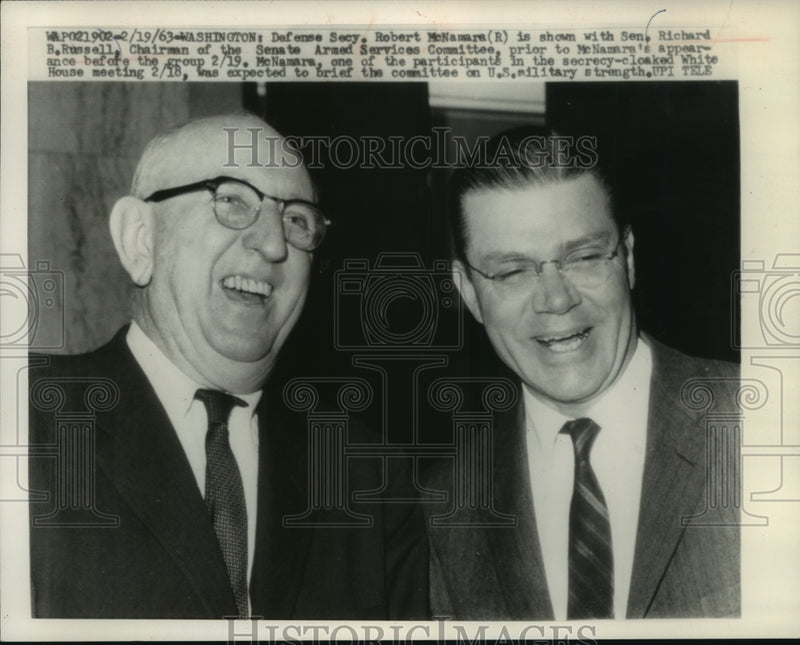 Load image into Gallery viewer, 1963 Press Photo Robert McNamara with Richard Russell before military brief.
