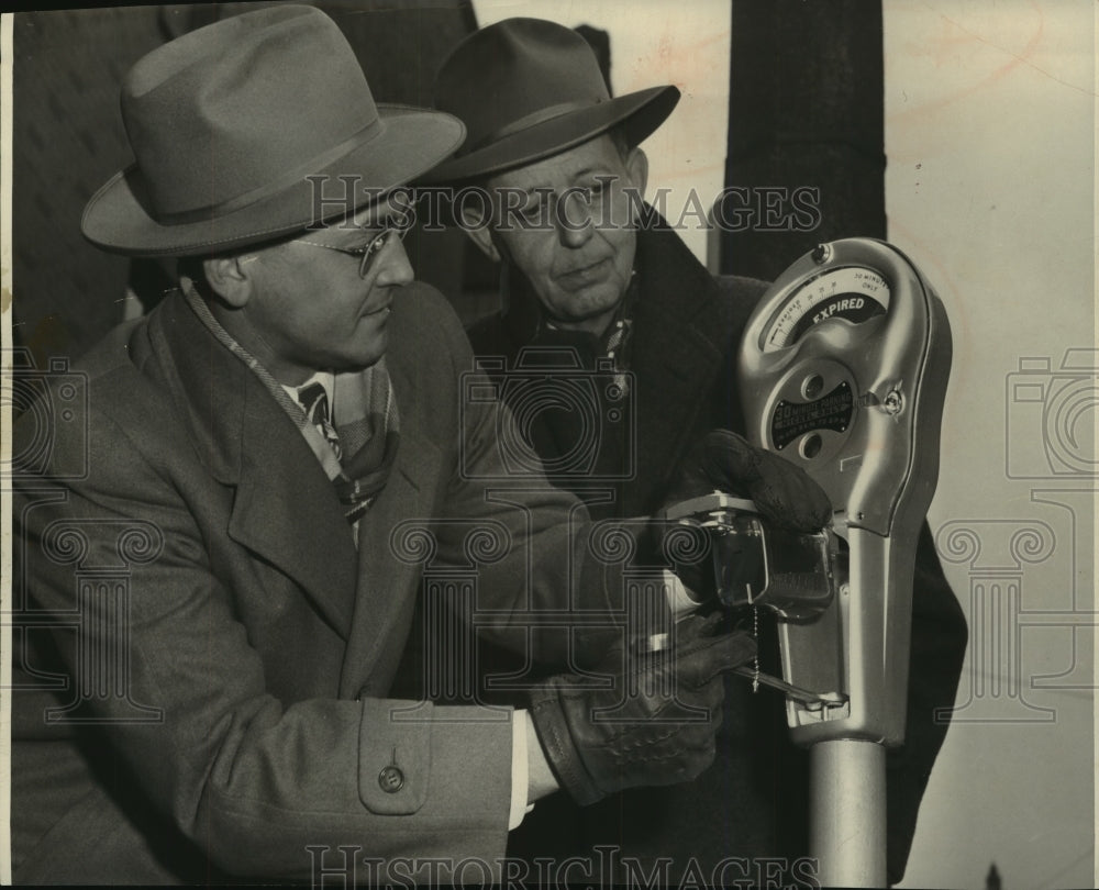 1949 Press Photo First Installation of parking meter heads, Milwaukee