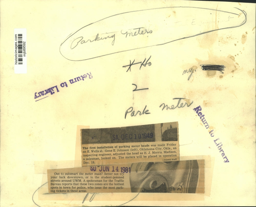 1949 Press Photo First Installation of parking meter heads, Milwaukee