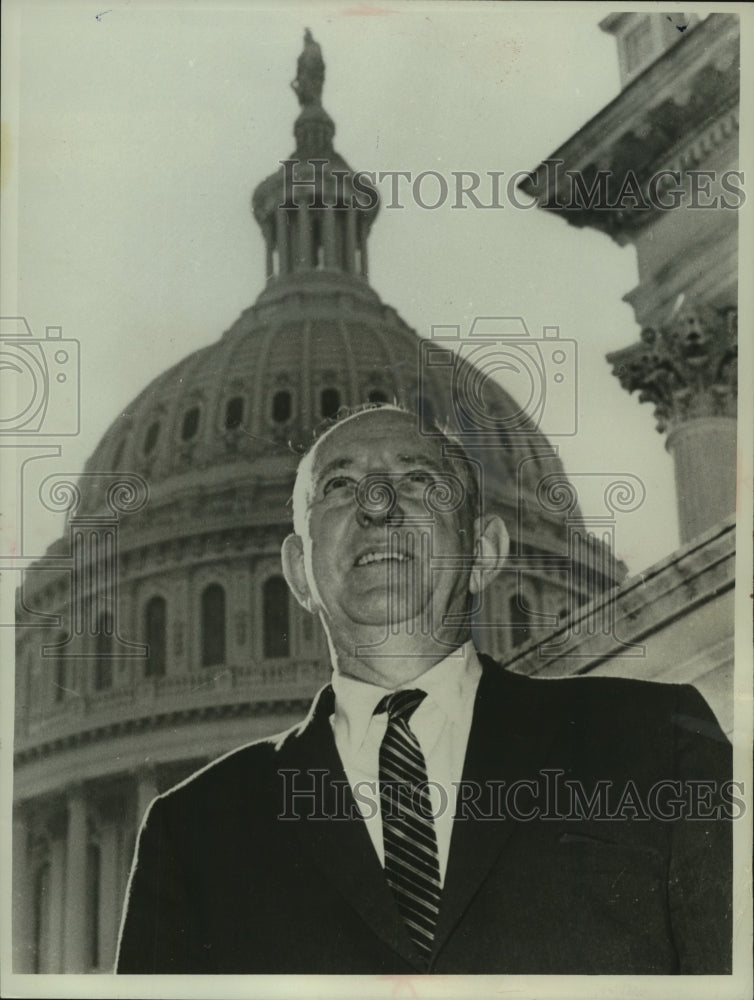 Load image into Gallery viewer, 1963 Press Photo Senator Richard Russell of Georgia against dome of the capitol
