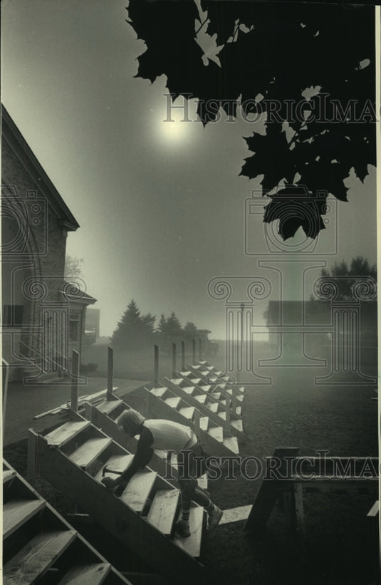 1967 Press Photo Robert Heikkinen, of Heikkinen Construction Co. works on stairs