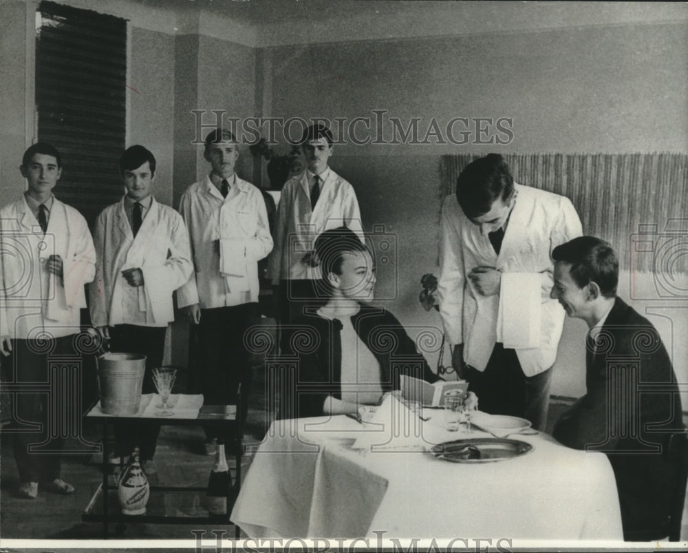 1966 Press Photo Hospitality students practice waiting etiquette in Poland- Historic Images