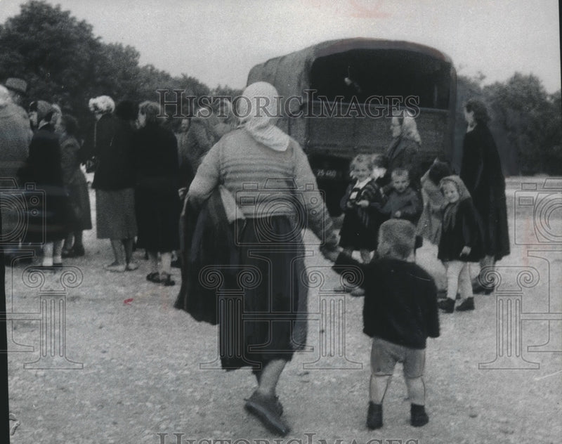Load image into Gallery viewer, 1956 Press Photo Passengers Ride In Former Army Trucks/ Buses In Poland
