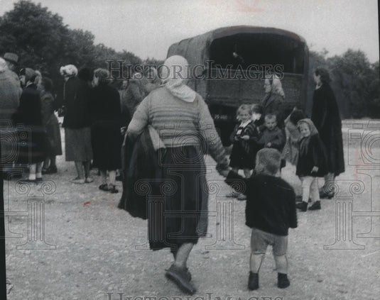 1956 Press Photo Passengers Ride In Former Army Trucks/ Buses In Poland