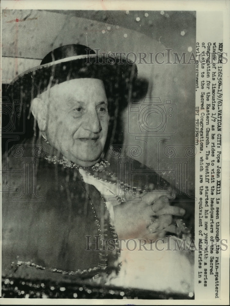 1961 Press Photo Pope John XXIII seen through rainy window of car, Vatican City.- Historic Images