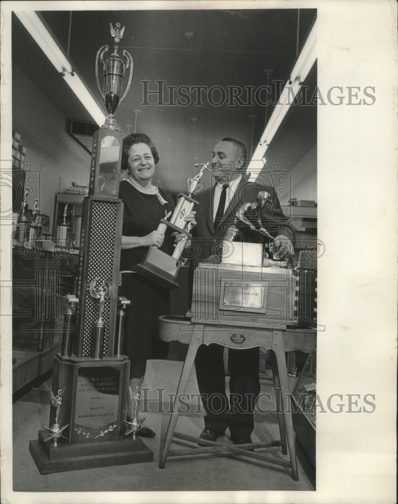 Load image into Gallery viewer, 1968 Press Photo Hyman D. Popuch of Trophy Athletic Supply Co., and wife
