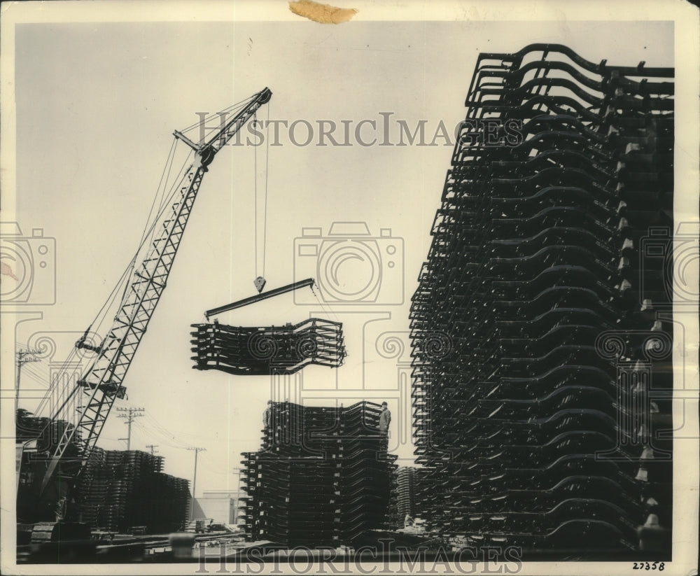 1955 Press Photo Stacks of auto frames made by A.O. Smith Corp.- Historic Images