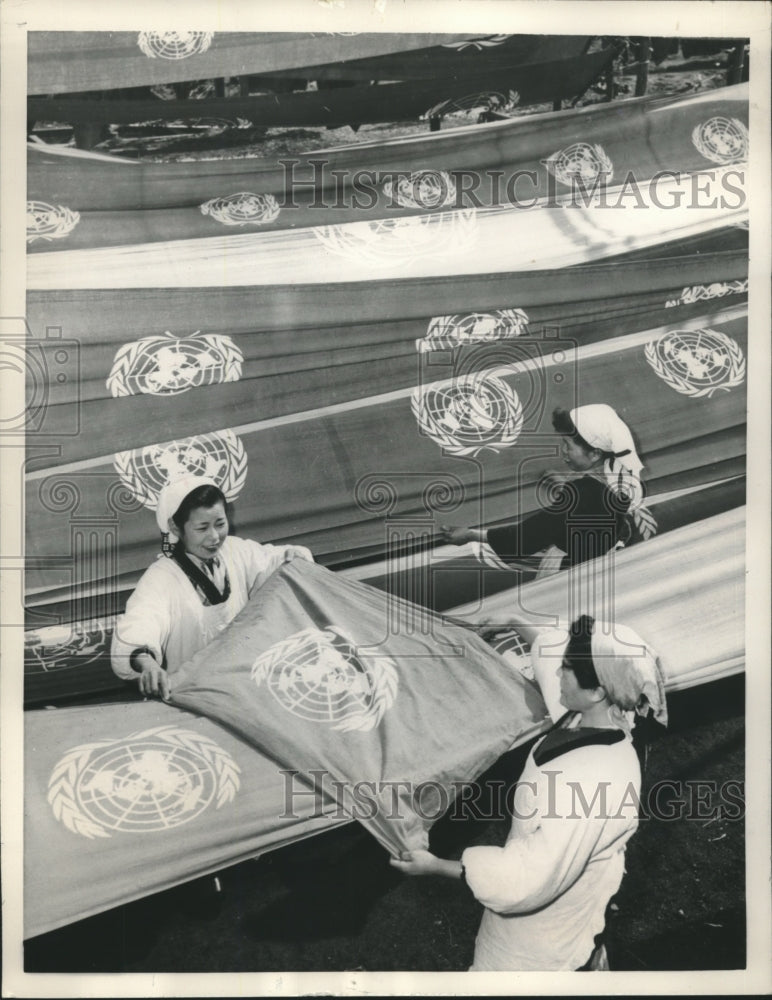 1957 Press Photo United Nations flags assembled in Tokyo - mjb98302- Historic Images