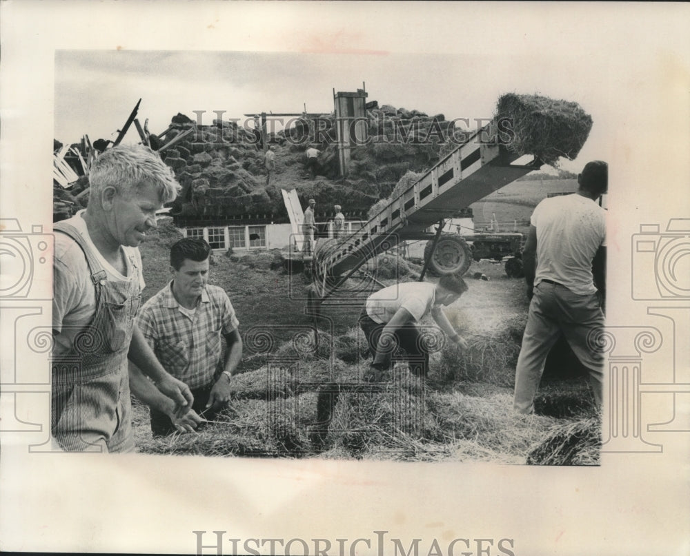 1963 Press Photo Argyle Neighbors help Donald Flannery after storm damaged barn