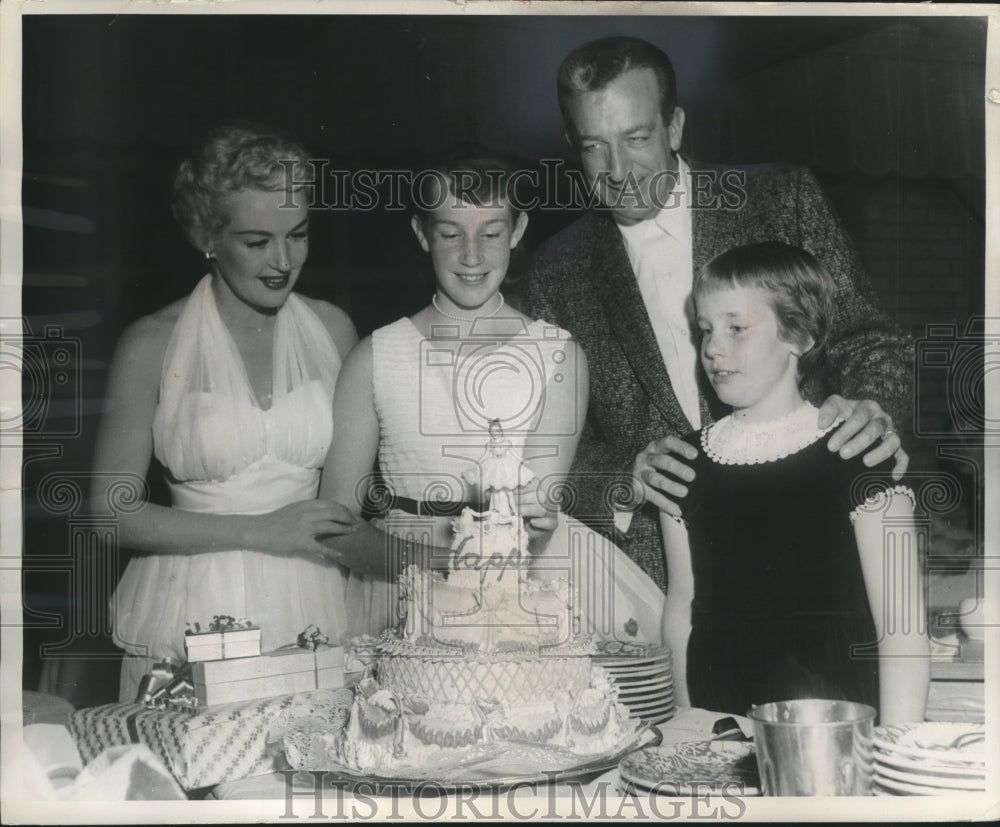 1956 Press Photo Vicky James (center) gets surprise birthday party from parents.- Historic Images